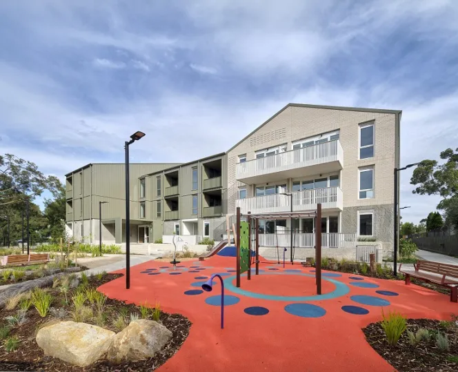 An image showing new homes and a playground that were built at the New Street, Brighton housing development. 