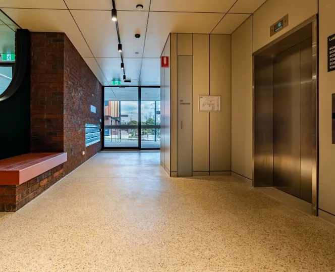 Image of new foyer with seating and lifts