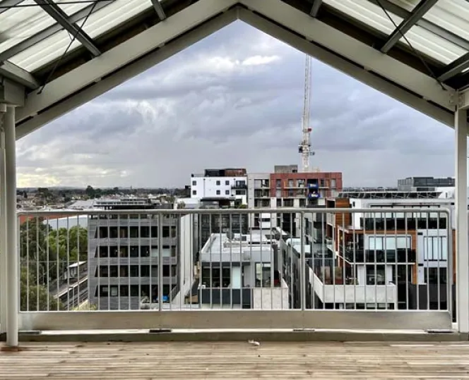 View from a balcony looking at apartments