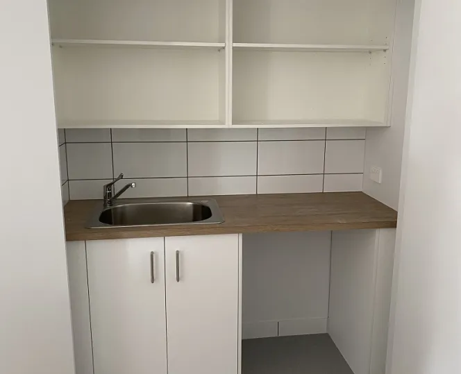 Image of laundry area with space to store laundry stuffs