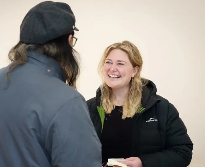 Image of homes Victoria staff having conversation with person