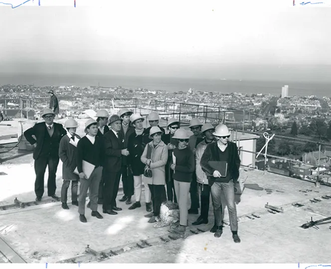 person showing visitors high-rise estate