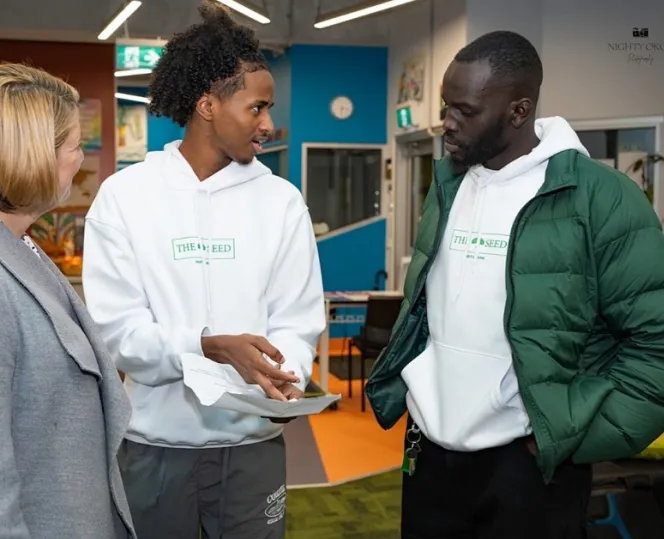 Image of people having discussion