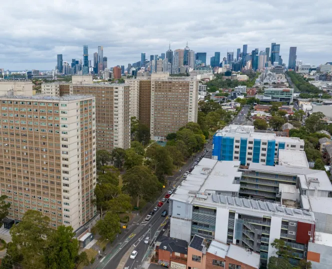 Aerial image of the Richmond precinct with the high-rise towers and the new building on Elizabeth Street visible with the Melbourne skyline in the background