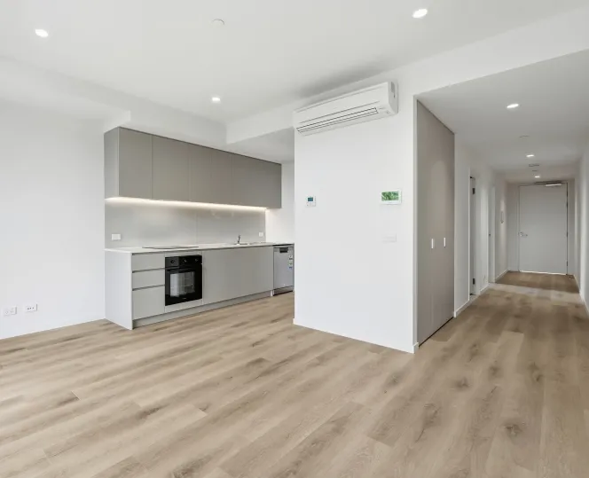 View of the kitchen, dining and living area and the entraceway 