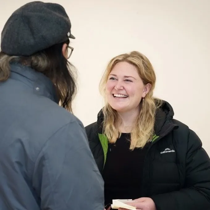 Image of homes Victoria staff having conversation with person 