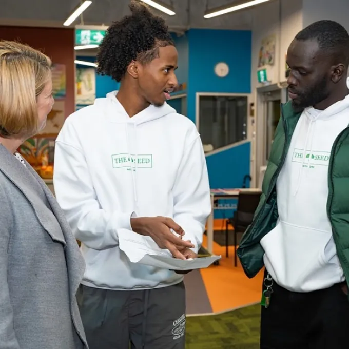 Image of people having discussion