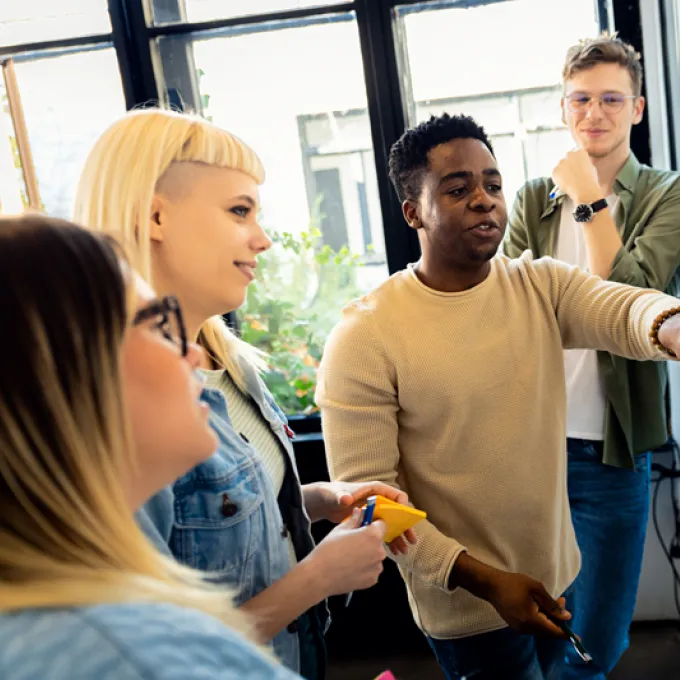 Image of group of people consulting with each other
