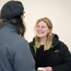 Image of homes Victoria staff having conversation with person 