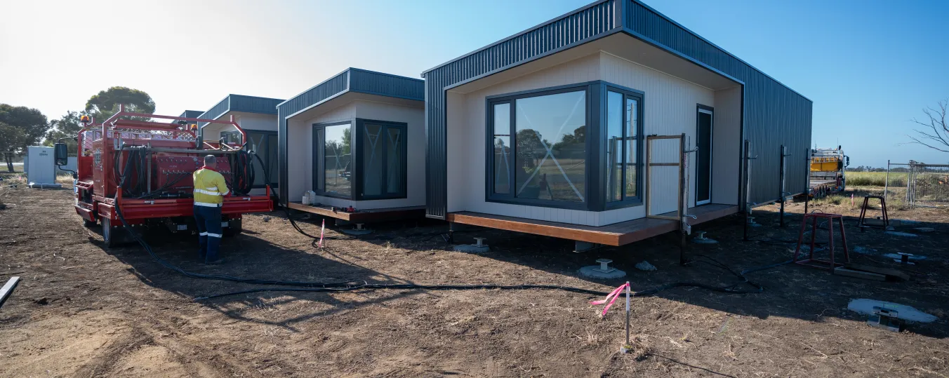 3 modular homes in place on a buidling site