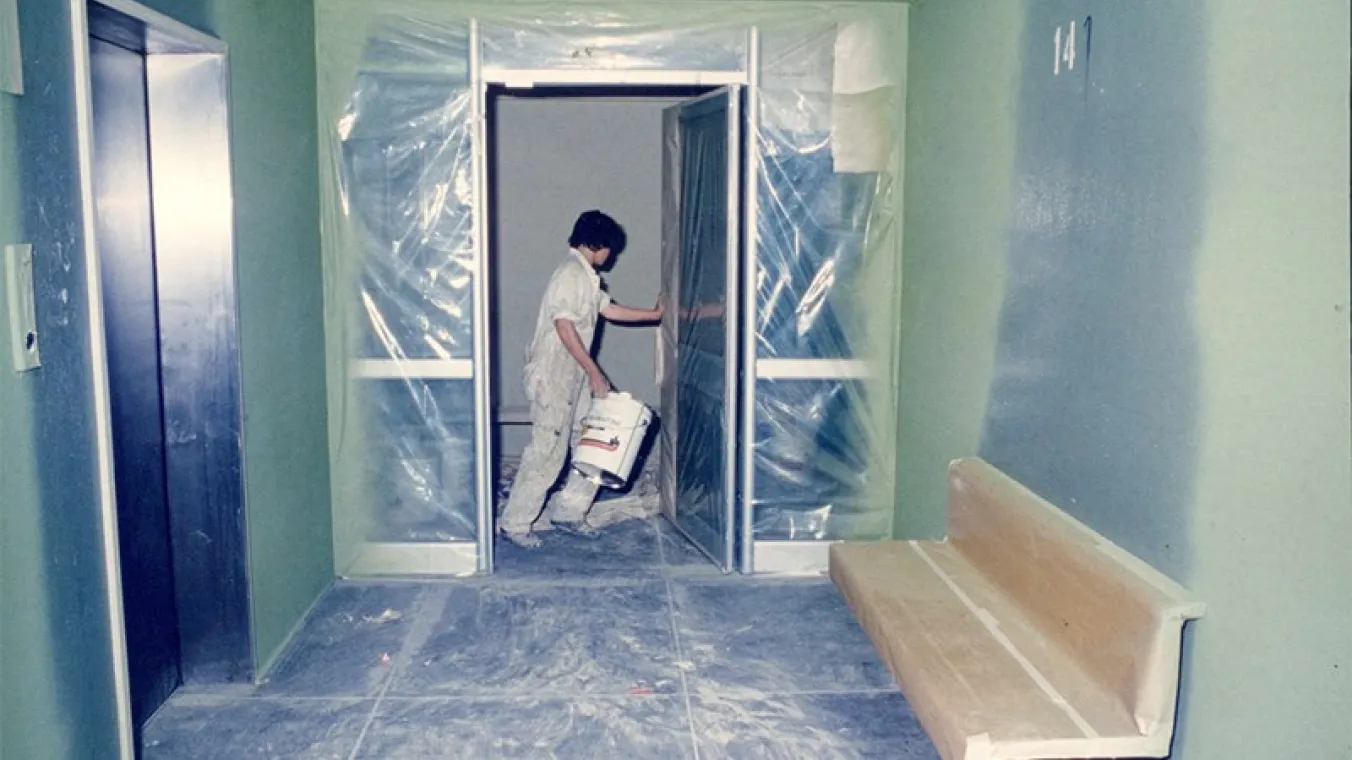 Image of person is working on High Rise Estate Improvement 