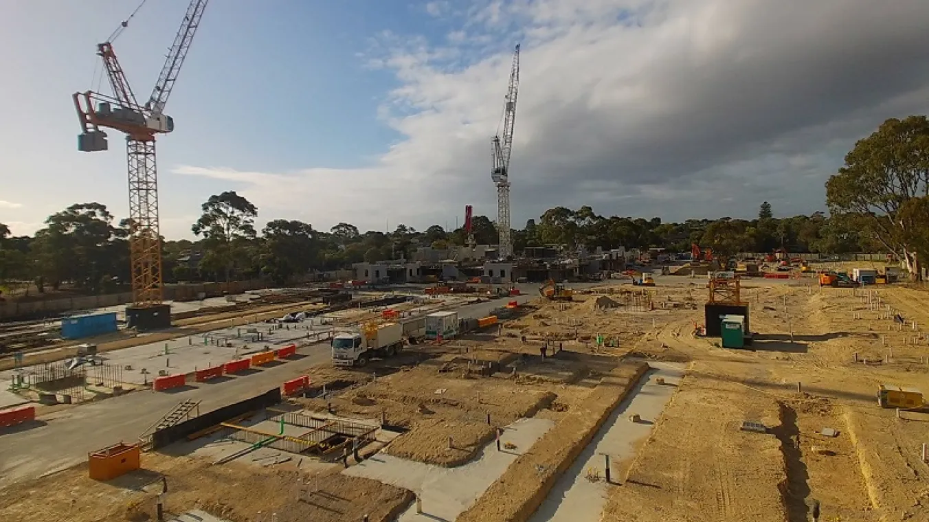 Image construction site with big cranes and construction materials