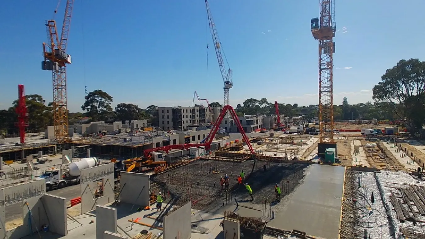 Image construction site with big cranes and construction materials