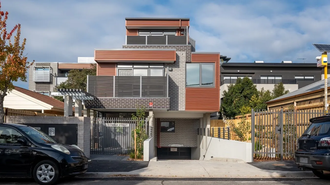 Image of newly built house with big windows allowing ample of sunlight to enter house,balcony and underground car space
