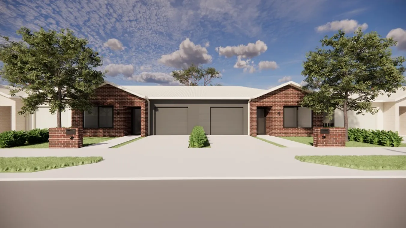 Image of house with red bricks and beautiful greenery and open area