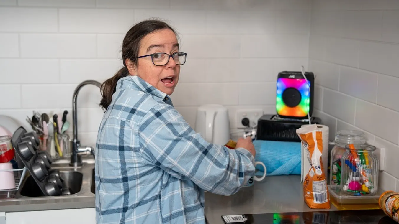 Image of a lady in a kitchen