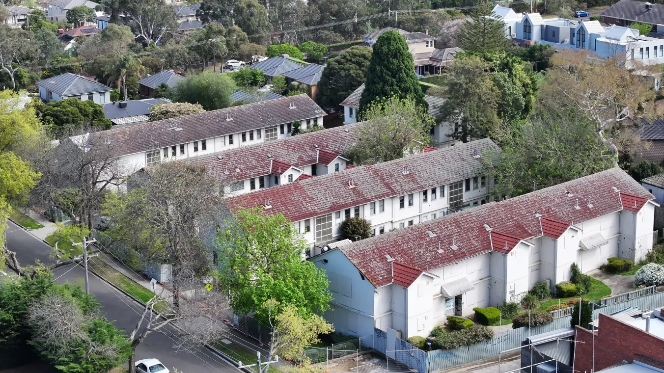 Drone image of residential houses at Alamein Avenue and Ambon Street in Ashburton.”