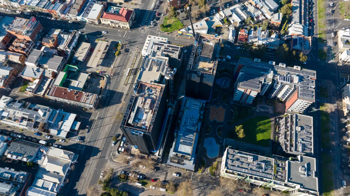 Drone image of Elgin Towers Carlton Crane installation with local community staying around