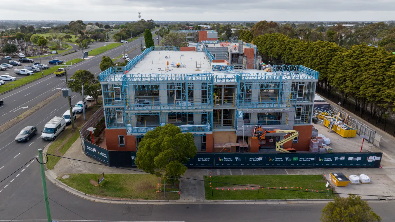 Aerial drone image showing active construction work along Ormond Road in Geelong, with machinery and road visible.