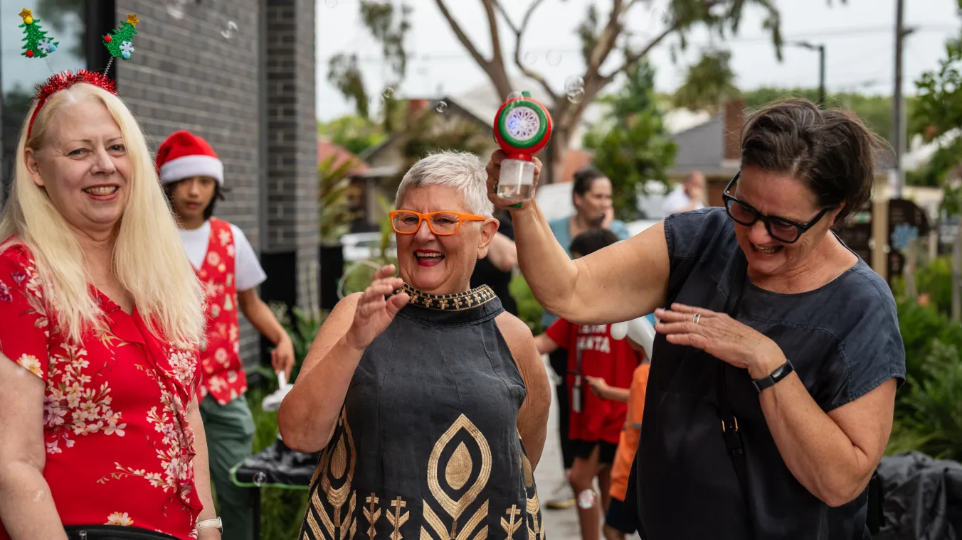 Image of Prahan GLM 1 community members enjoying end of year celebration