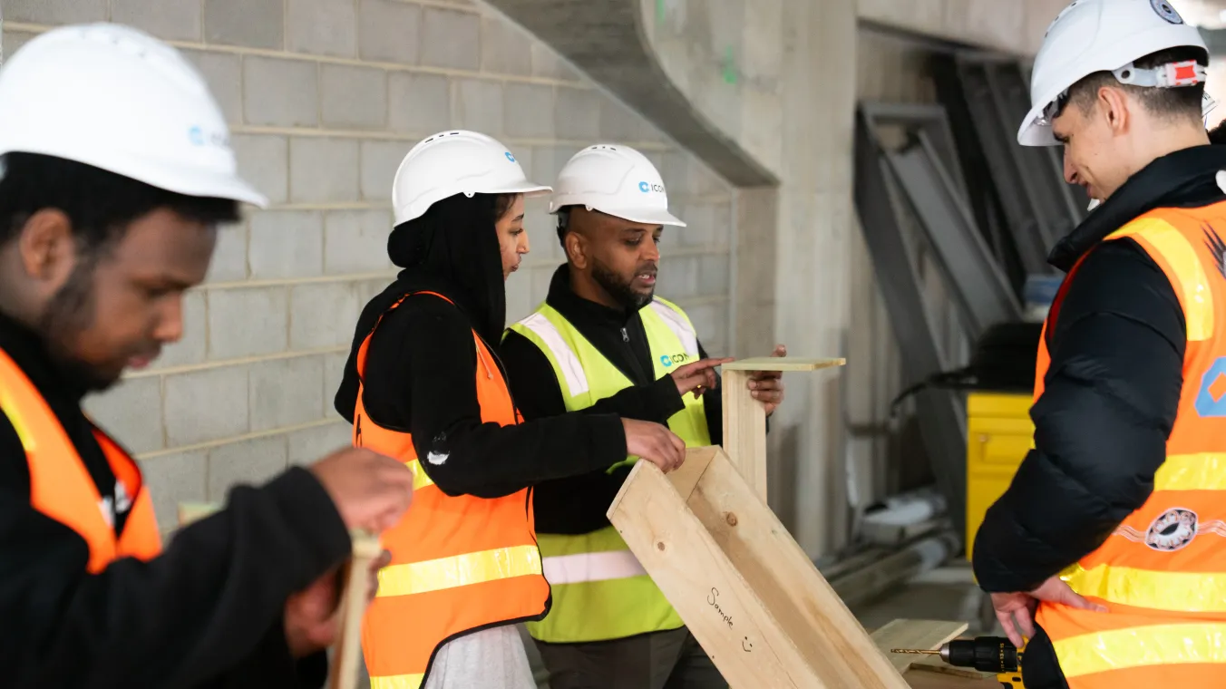 Tradies working at the Holland Court redevelopment site in Flemington, empowering  women in trade