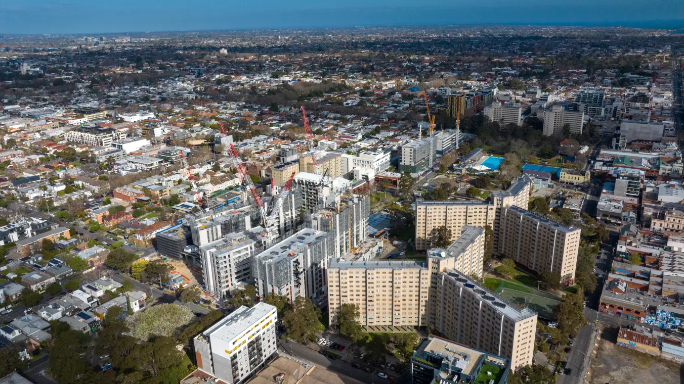 Aerial view of a tall residential building in South Yarra and Prahran, showing nearby streets and surrounding neighbourhood.
