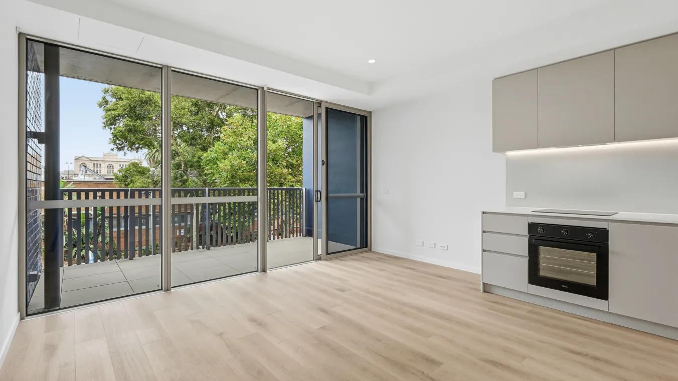 View of the living area and outdoor balcony 