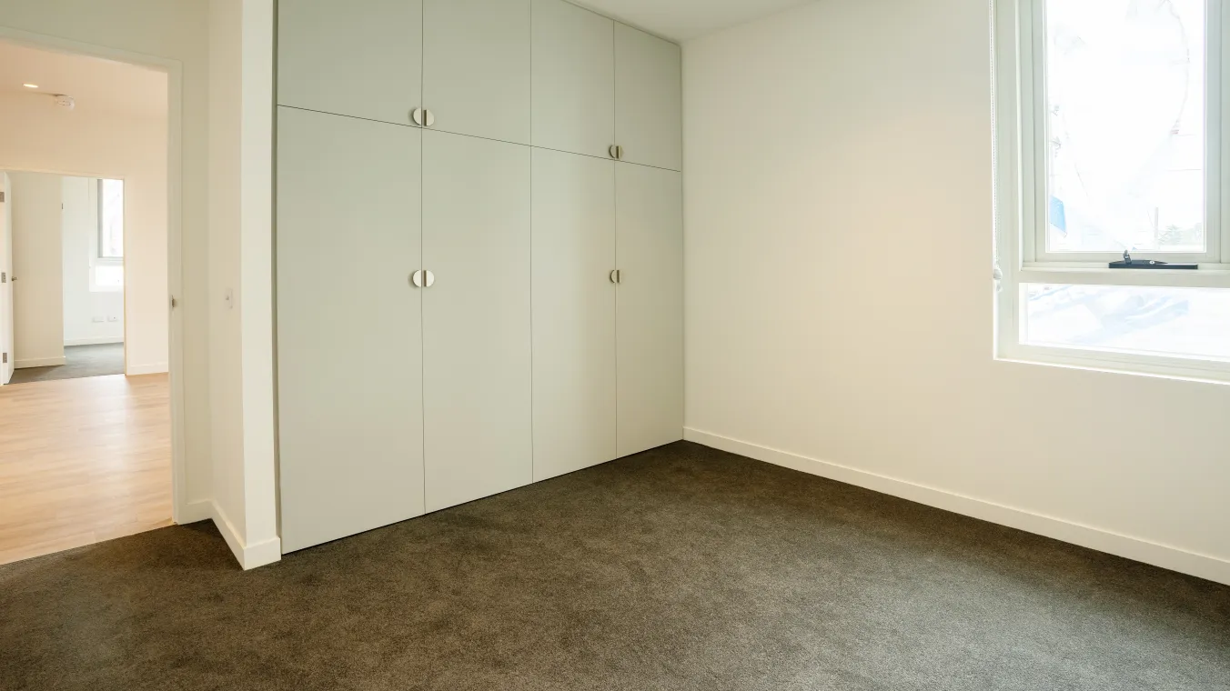 Built-in wardrobe inside a brand-new apartment at Ormond Road, East Geelong.  